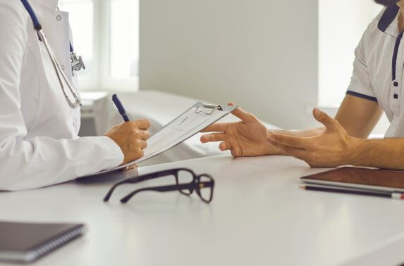 Patient consulting doctor about allergic asthma prevention